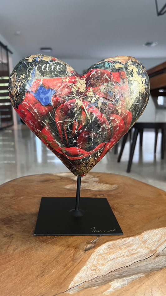 mixed media collage scupture of a heart with resin for home decoration