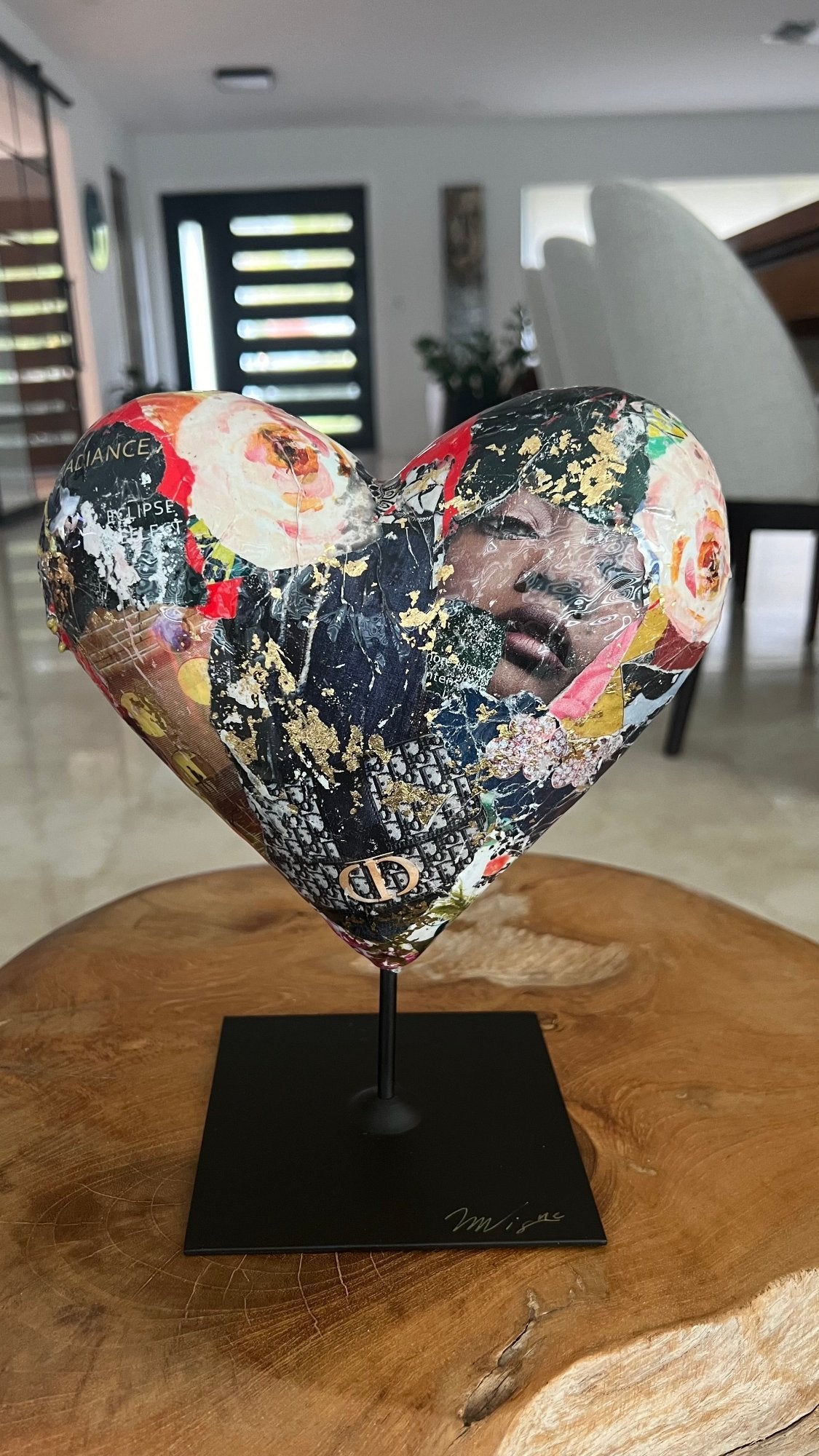 Unique mixed media heart sculpture with a combination of collage and gold leaf